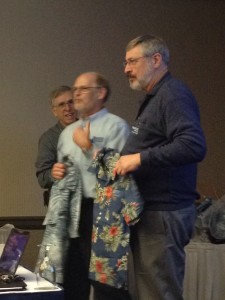 Tom and Mike hand out our new Region 6 shirts.